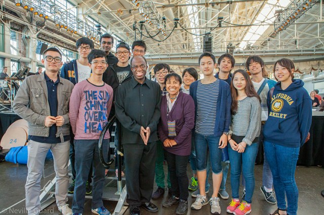 Liliane Koziol, Director of Programs (also past president of the Richmond Rotary) and students with Michael Morgan’s Oakland East Bay Symphony.