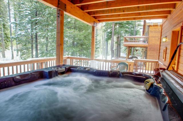 A jacuzzi tub the size of a pool, on the deck!