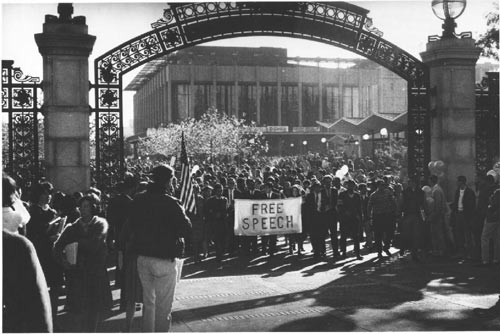 Group carrying “Free Speech” banner through Sather Gate [ca. 1965]. Credit: Courtesy of UC Berkeley, The Bancroft Library