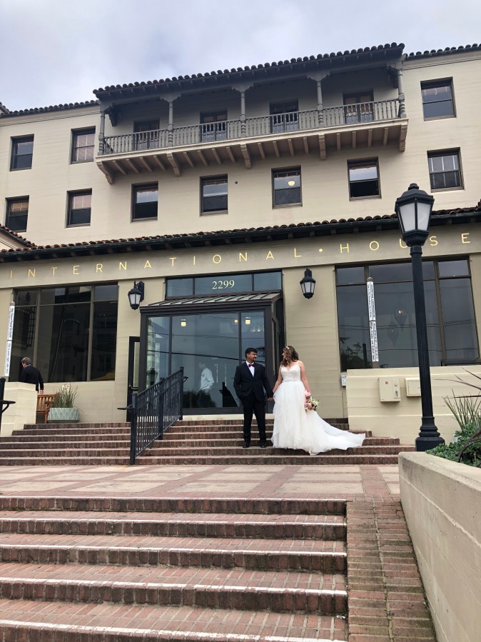 Dania and Zunaid on the front steps of I-House