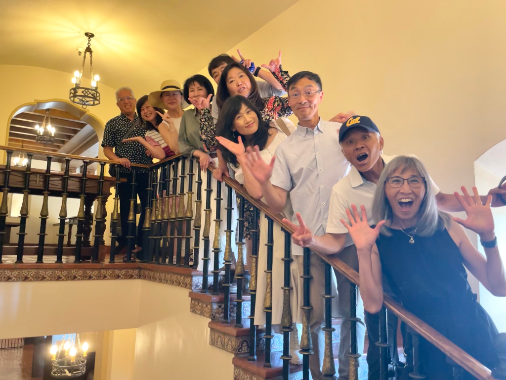Photo of the alumni on the same steps