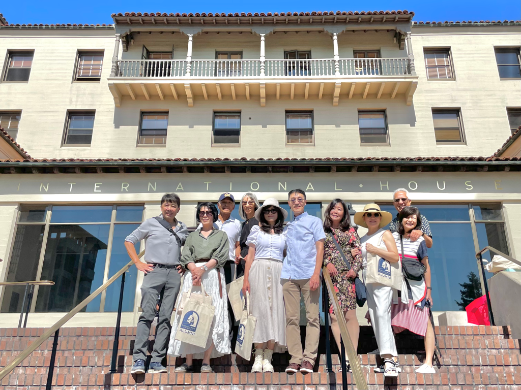 Photo of the alumni with their spouses and friends