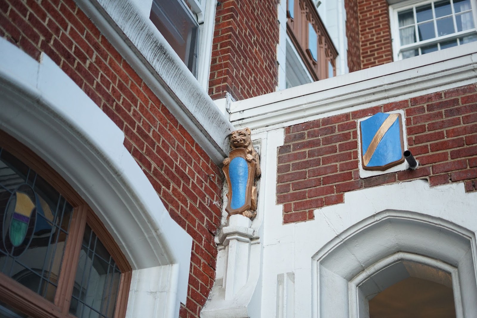 A Gargoyle like structure in the form of bear adorns the entrance to the Bishop Berkeley Apartment Building.