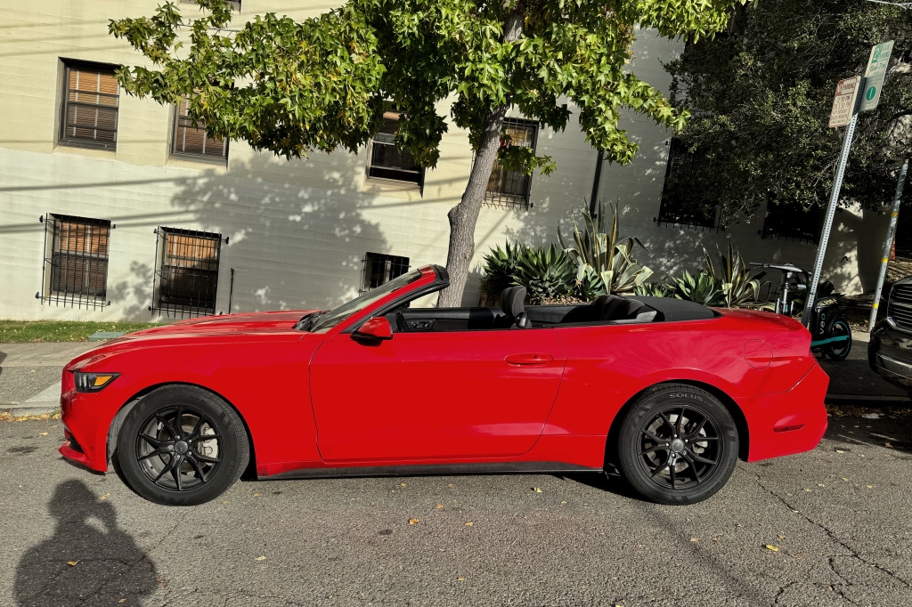 A Red Convertible Sports Car.