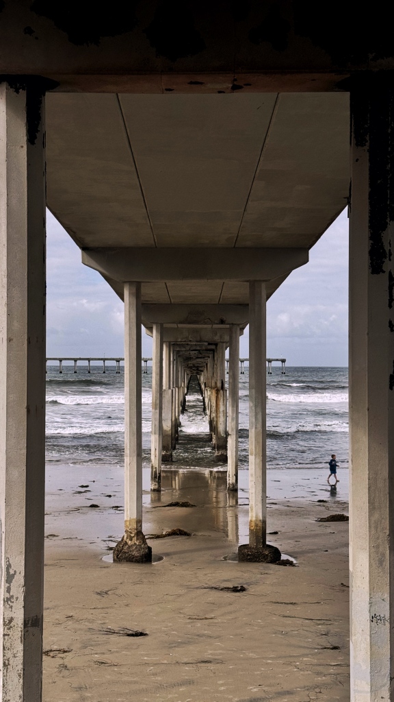 A photo of the underside of a pier.