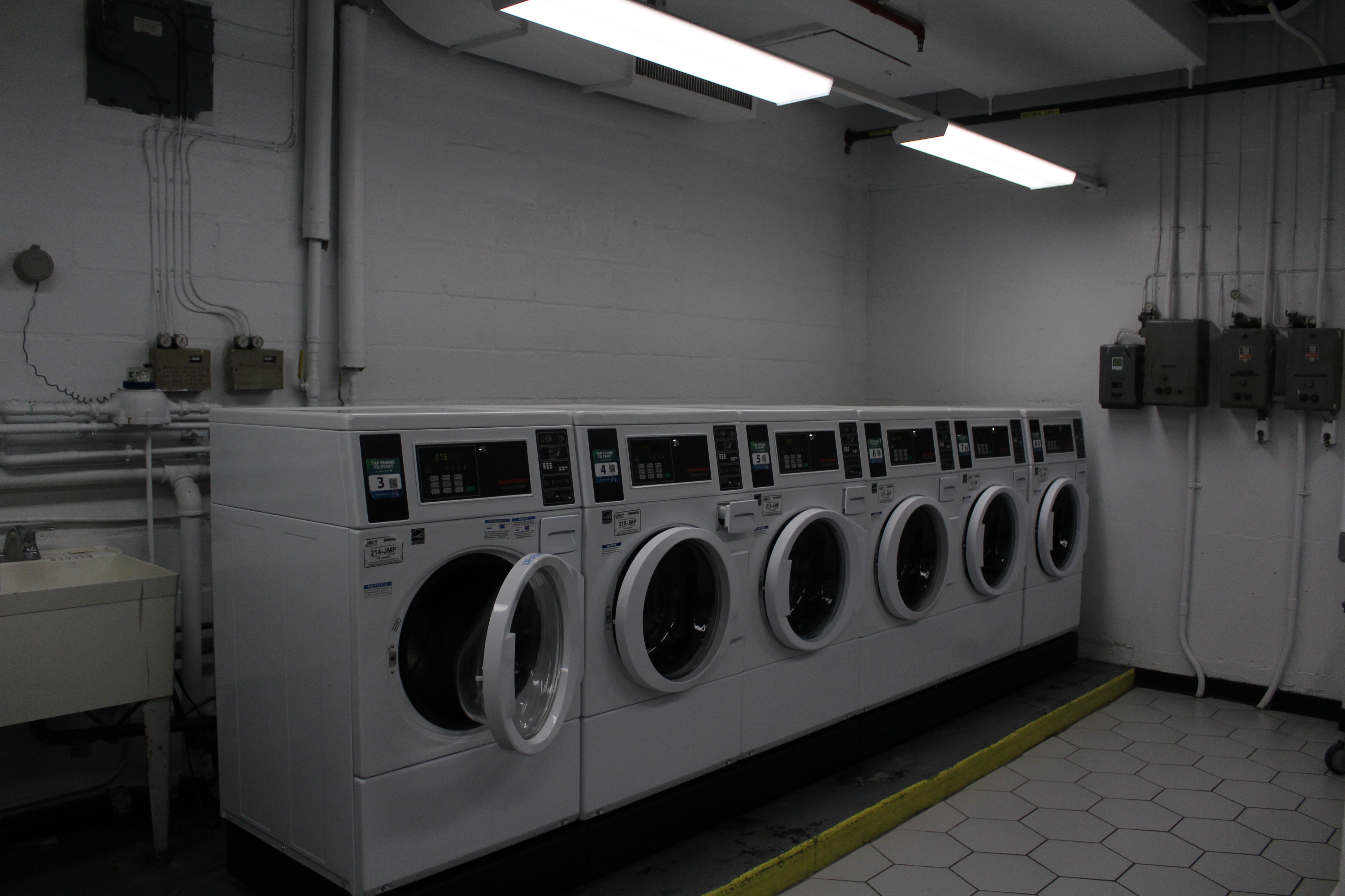 Washing machines in a line.