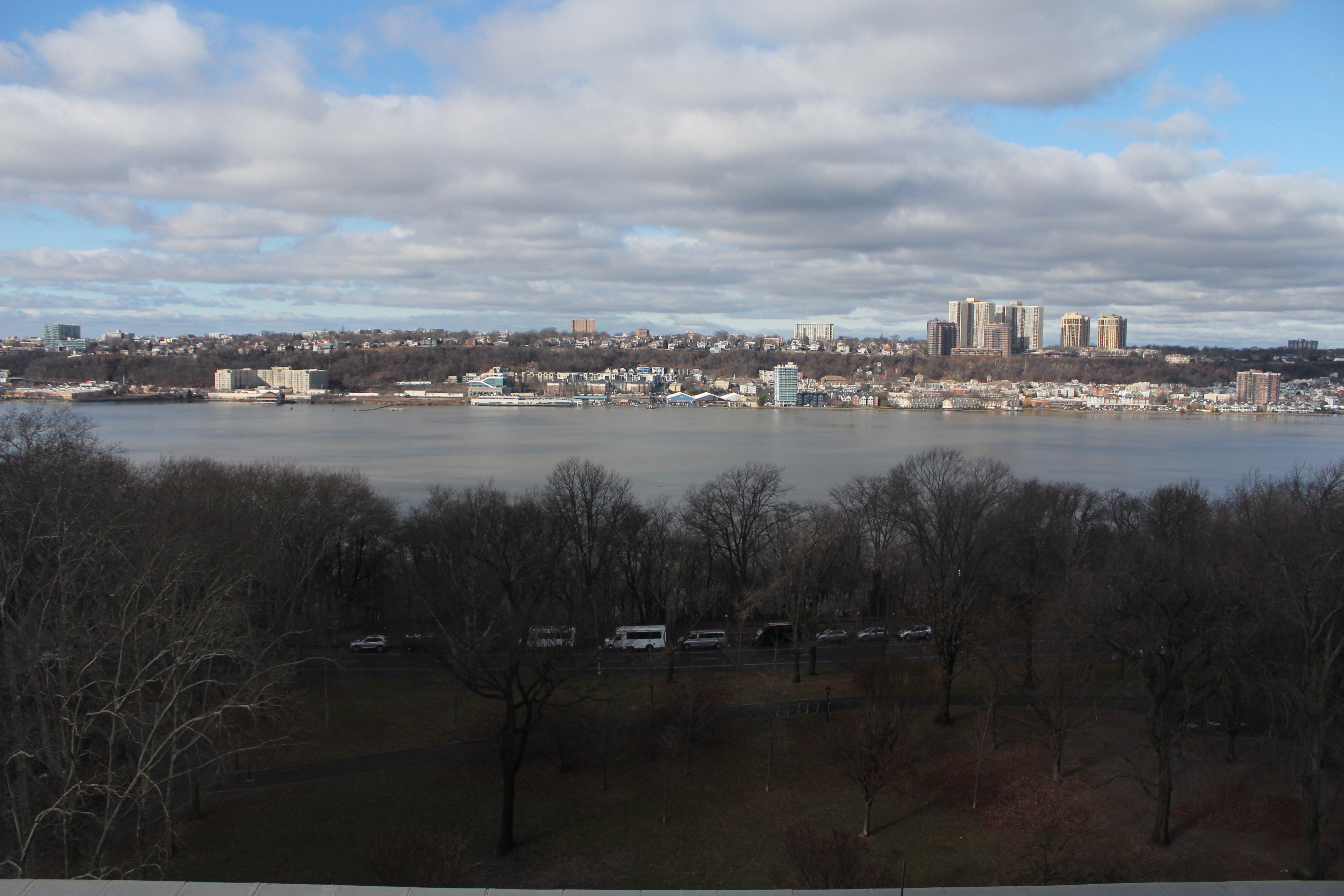 A view of buildings across a river.